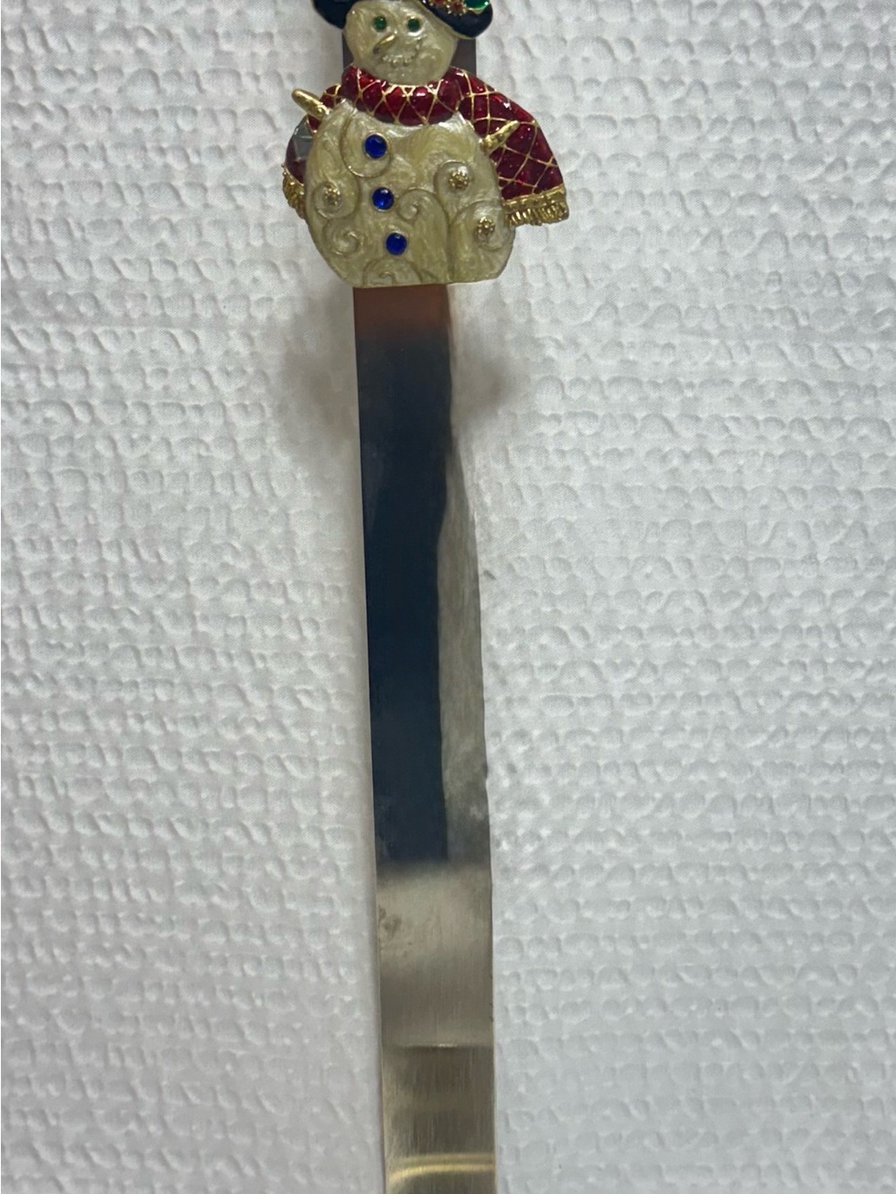 Vintage metal stocking holder with Snowman Enamel Bookmark Gold & Red